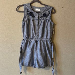 Denim romper with floral embroidered detail